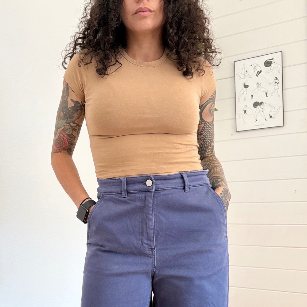 The open product baby tee